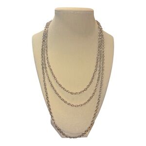 Avon silver tone triple strand chain with beautiful large clasp. J25